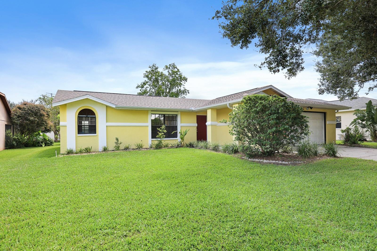Beautifully updated 3-bedroom, 2-bath, 2-car home with a 2-car garage in a prime location! This home features modern cabinetry, stylish lighting, ceiling fans, and sleek hardware throughout. Gorgeous laminate and tile flooring flow seamlessly across the entire home, creating a clean and cohesive look.
The updated kitchen is a true highlight, offering granite countertops, stainless steel appliances, a breakfast bar, a pantry, and a convenient pass-through window to the lanai. It opens to a cozy eat-in area and a spacious family room with direct access to the large screened-in lanai—perfect for indoor-outdoor entertaining!
Enjoy multiple living spaces, including a formal living and dining room combo with plenty of natural light.
This smart split floor plan features a primary suite located at the front of the home, complete with an oversized walk-in closet and a luxurious en-suite bath. The bath includes a walk-in shower, soaking tub, dual sinks, and modern cabinetry. Two additional bedrooms are situated on the opposite side of the home and share a beautifully updated hall bath.
Step outside through sliding glass doors to the expansive screened lanai, overlooking a HUGE backyard—ideal for barbecues, relaxing afternoons, or outdoor play.
Complete lawn maintenance, including mowing, shrub pruning, irrigation system service, turf, and plant fertilization and plant pest control are included in rent services saving you time and money! Unbeatable location just minutes from shopping, dining, medical facilities, entertainment, and easy highway access!
NOTE: Additional $59/mo. Resident Benefits Package is required and includes a host of time and money-saving perks, including monthly air filter delivery, concierge utility setup, on-time rent rewards, $1M identity fraud protection, credit building, online maintenance and rent payment portal, one lockout service, and one late-rent pass. Renters Liability Insurance Required. Call to learn more about our Resident Benefits Package.