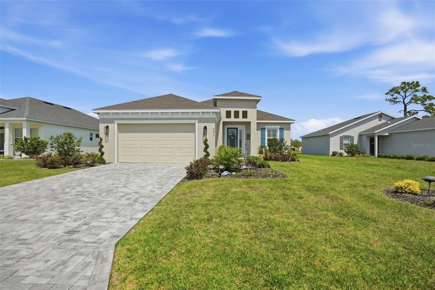 Welcome home to this stunning, move-in ready residence located in the highly sought-after, guard-gated golf community of Glen Lakes. Built in 2025, this modern home offers all the benefits of new construction, without the wait. Step inside to an open floor plan with high ceilings and elegant tray ceilings in both the living room and primary suite. Luxury vinyl plank flooring flows seamlessly throughout, enhancing the home's modern appeal and easy maintenance. Natural light fills the space through the tall glass triple slider, creating a bright and inviting atmosphere throughout the main living areas. The beautiful chef's kitchen is a true centerpiece, featuring quartz countertops, wood cabinetry, stainless steel appliances, a sleek range hood, a large center island perfect for entertaining, and a large walk-in pantry. Retreat to the spacious primary suite, complete with tray ceilings, dual walk-in closets, and a spa-like ensuite bathroom featuring floor-to-ceiling tile, a separate walk-in shower, and a luxurious soaking tub. The home also offers generously sized guest bedrooms, each with walk-in closets, and a well-appointed guest bathroom featuring dual vanities and a walk-in shower, ideal for family or visitors. Step outside to your screened-in brick paver patio and relax in the large hot tub while overlooking peaceful pond views. The matching brick paver driveway enhances curb appeal and complements the elegant exterior, making this home as inviting outside as it is inside. Glen Lakes is a premier guard-gated community, featuring an award-winning Ron Garl-designed 18-hole golf course, a stunning clubhouse with a restaurant and ''19th Hole'' bar & grill, an elegant banquet hall, fitness center, Jr. Olympic-style pool, hot tub, pickleball and tennis courts, shuffleboard, and a wide range of social activities to stay connected with your neighbors. Experience the ultimate Florida lifestyle with comfort, style, and community all in one exceptional home. Schedule your private showing today!