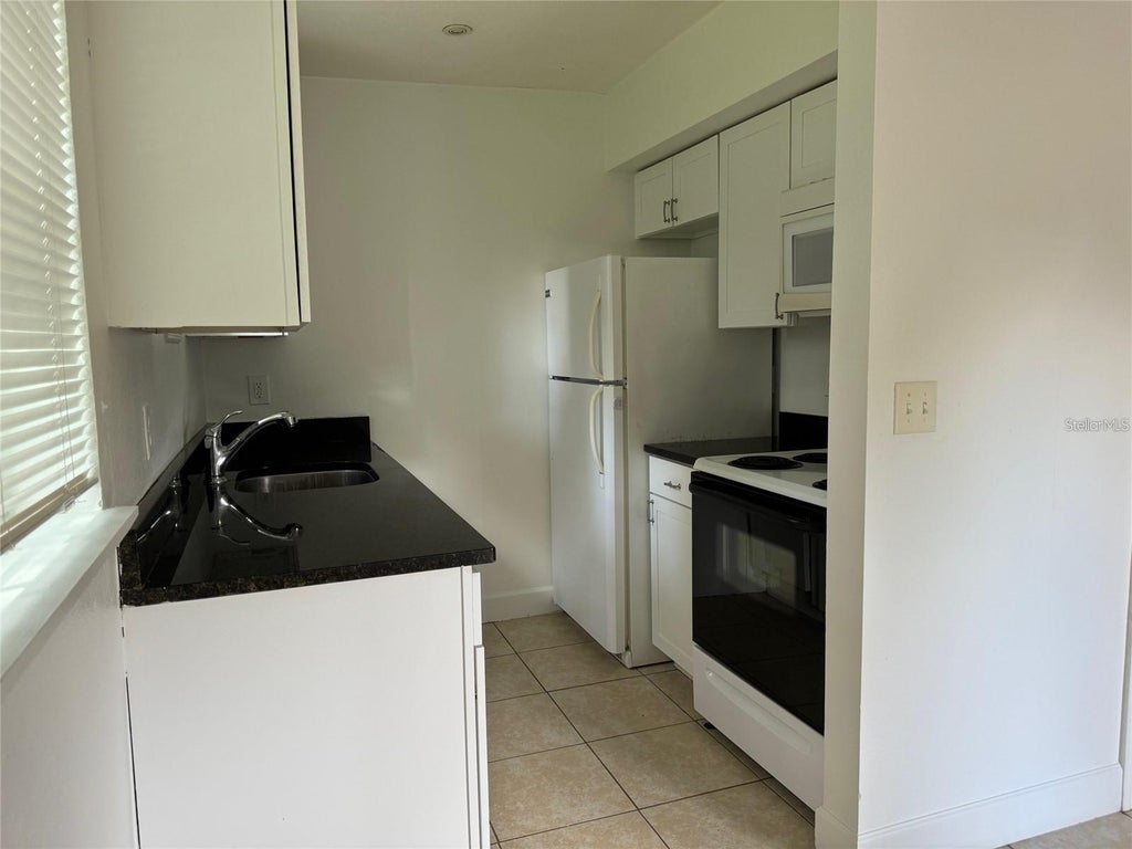 Photo of 2416 S Mayer Avenue #6, Orlando, FL 32806 (MLS # O6438229)