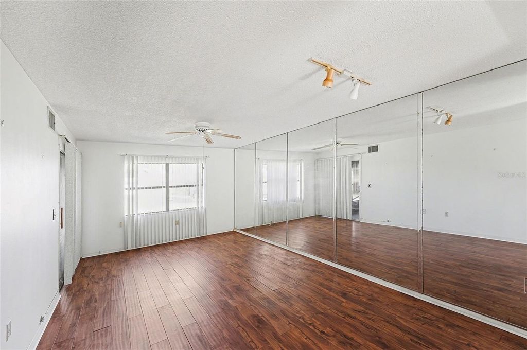 Photo of 1522 Mission Hills Boulevard, Clearwater, FL 33759 (MLS # TB8467984)