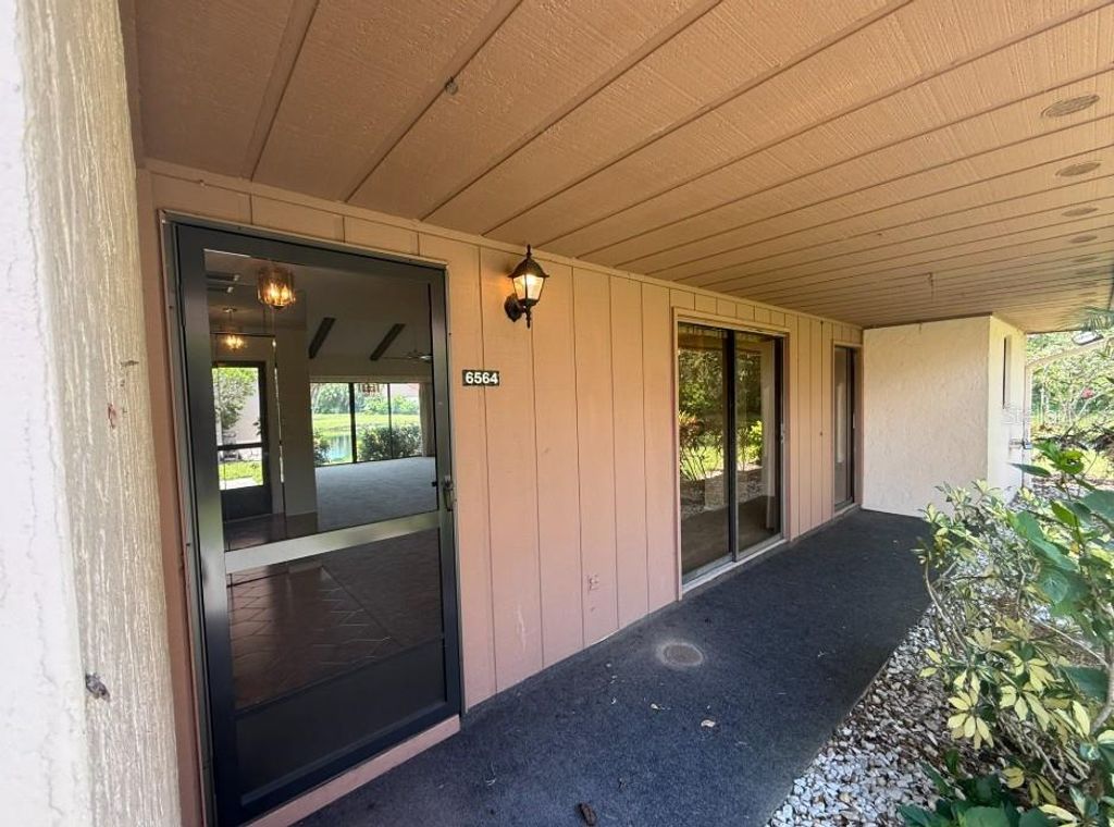 Photo of 6564 Draw Lane #102, Sarasota, FL 34238 (MLS # A4659529)