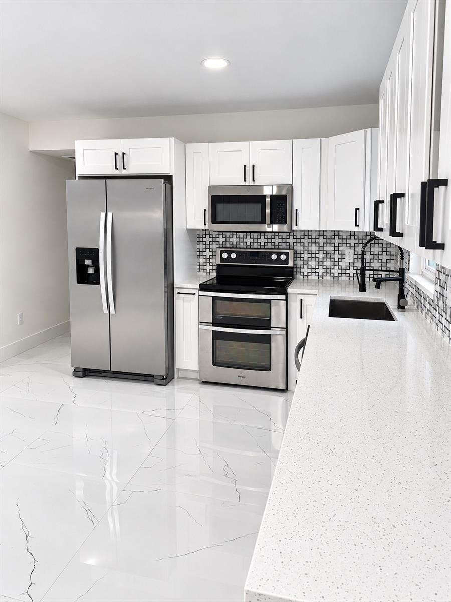 Photo of 345 Country Club Drive, Oldsmar, FL 34677 (MLS # TB8549823)