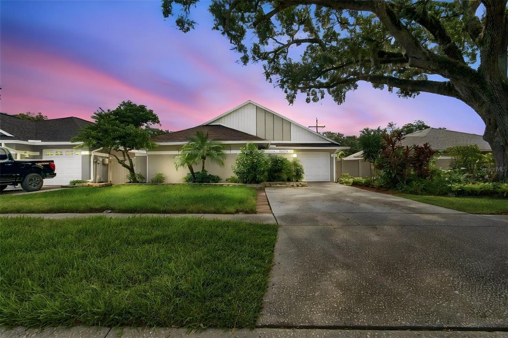 Photo of 11905 Hickorynut Drive, Tampa, FL 33625 (MLS # TB8550842)