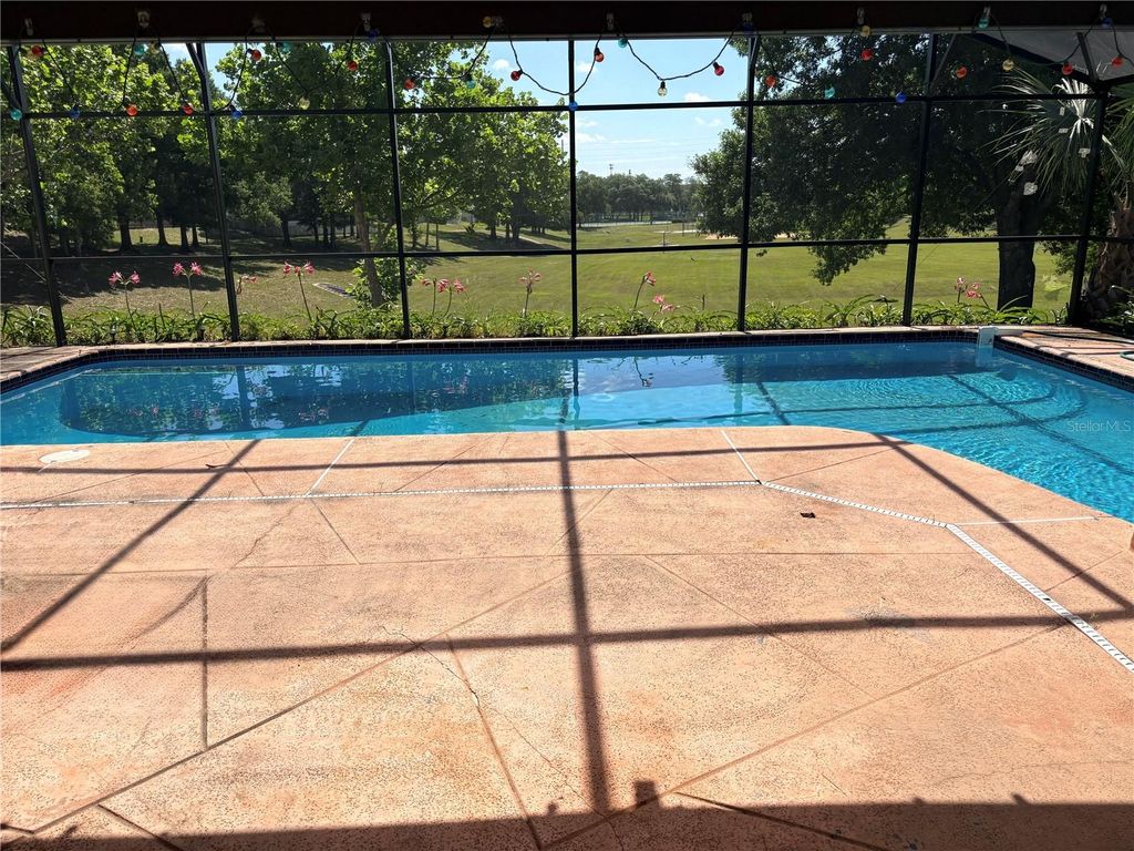 Photo of 1105 Indian Ridge Trail E, Kissimmee, FL 34747 (MLS # O6407754)