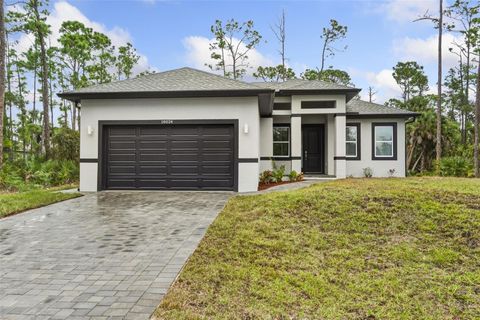 Photo of 18024 Placid Avenue, Port Charlotte, FL 33948 (MLS # O6359748)