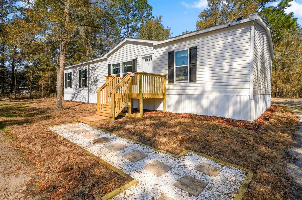 Photo of 6951 NE 104 Court, Bronson, FL 32621 (MLS # GC539088)