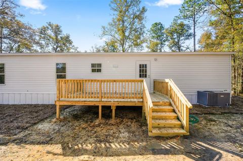 Tiny photo for 6951 NE 104 Court, Bronson, FL 32621 (MLS # GC539088)