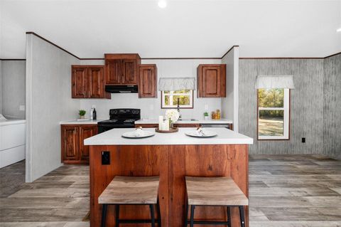 Tiny photo for 6951 NE 104 Court, Bronson, FL 32621 (MLS # GC539088)