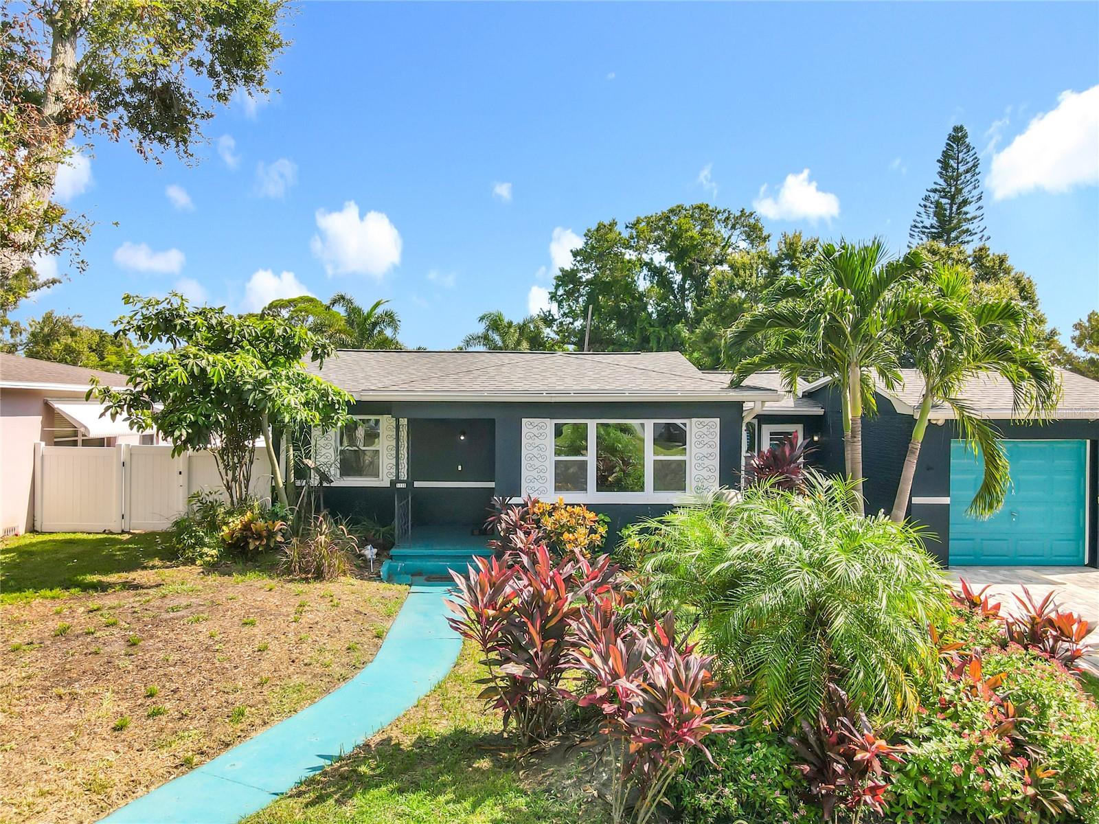 Nestled in the heart of St. Petersburg, this incredibly unique and meticulously renovated home offers the ultimate in convenience and Florida lifestyle. Your new address places you just a short drive from everything that makes St. Pete famous: the pristine sands of the Gulf beaches, the vibrant energy of downtown, and the beautiful Intercoastal Waterway. Step outside and find yourself immersed in the eclectic buzz of Central Avenue, with its hip new restaurants, cozy coffee shops, lively bars, craft breweries, art galleries, and music venues all right at your fingertips.
This stunning 3-bedroom, 2-bathroom home has been completely transformed, boasting over 1,500 square feet of beautifully updated living space. You are welcomed by beautifully refinished hardwood floors and a fresh, modern palette of new interior and exterior paint. The modern custom kitchen is a chef's delight, featuring sleek stainless steel appliances, granite counters, hardwood cabinets, and beautiful tile flooring. The bathrooms are equally impressive, showcasing stylish tile showers, beautiful cabinets and countertops, and updated lighting.
The list of features continues with a peaceful screened-in back porch, perfect for enjoying the Florida breeze, and a large, inviting yard. Soak in the new above ground pool that can stay or go. This oversized lot has room for large RV parking AND Boat parking! With a one-car garage and a location that is close to shopping, fine dining, and endless entertainment, this is a must-see property. Call to schedule a showing today.