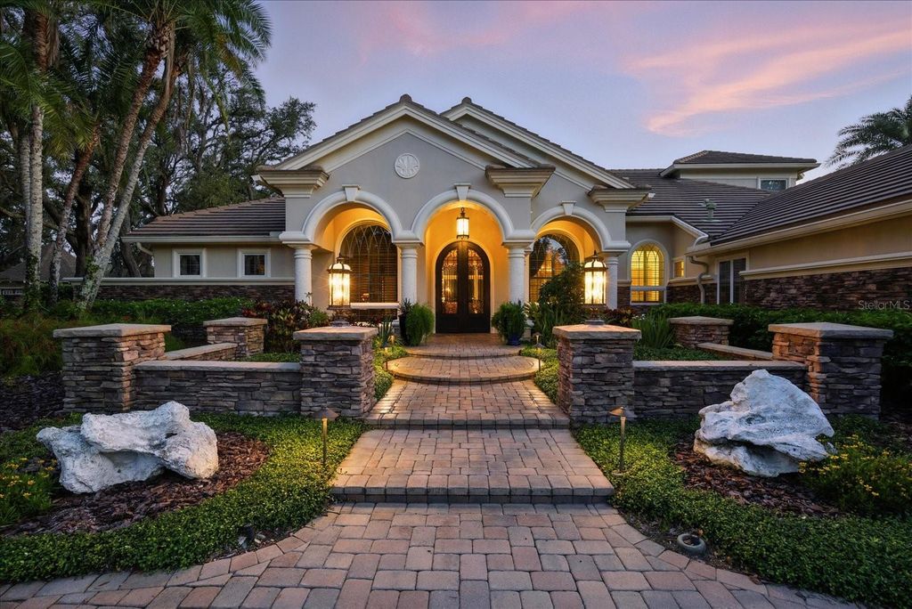 Photo of 973 Royal Birkdale Drive, Tarpon Springs, FL 34688 (MLS # TB8412498)