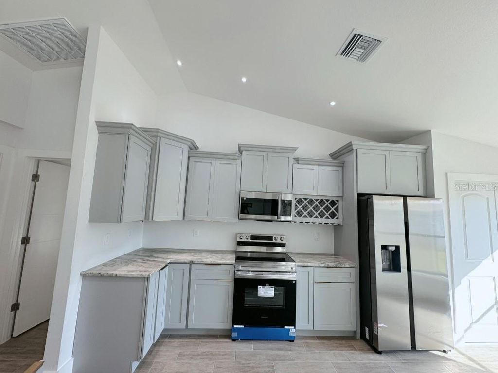 Photo of 1541 Music Lane, North Port, FL 34286 (MLS # A4670833)