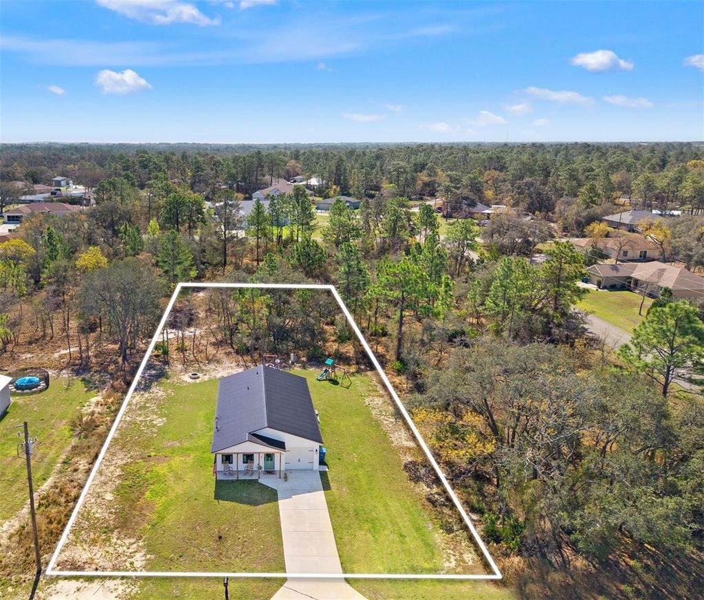 Photo of 12482 Mountain Plover Rd, Weeki Wachee, FL 34614 (MLS # W7883806)