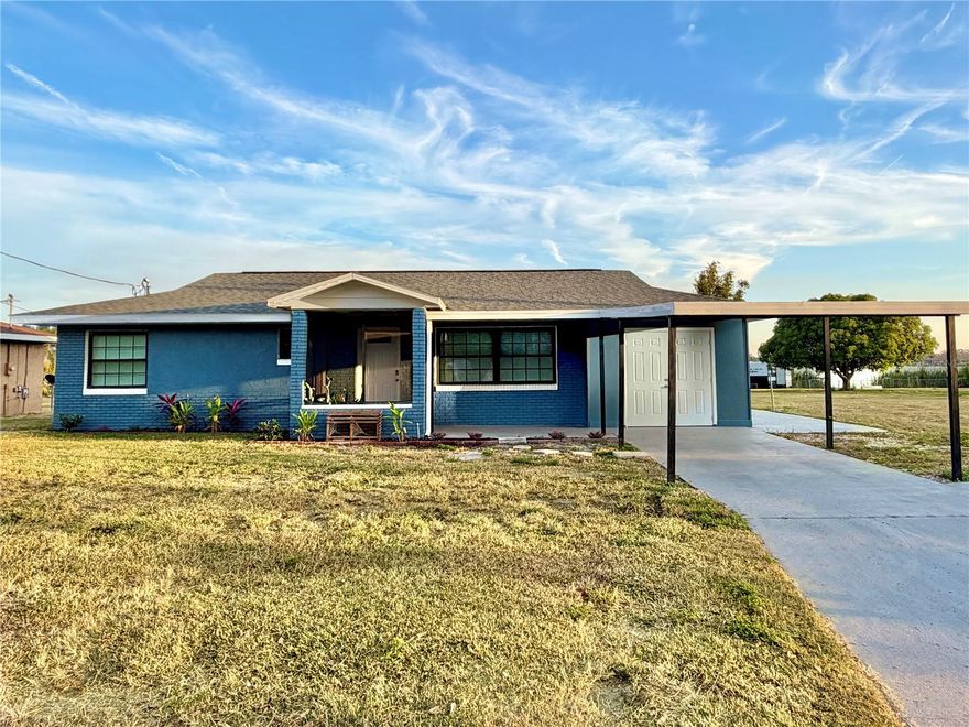 A Winter Haven Chain of Lakes Home with a large screened pool and boathouse for under 500K? Yes! This 3-bedroom, 2-bath home sits on Lake Conine and has received a first-class renovation from roof to floors. The beautiful lakefront home features a brand new roof, 4-ton A/C, and water heater all installed in 2025. The interior living area features new luxury vinyl plank, new fixtures, new doors, new blinds, and new paint throughout. The living room is spacious and includes a beautiful blue feature wall which separates the living room and kitchen. The kitchen features tons of solid wood cabinets, granite countertops, and brand new stainless appliances. It includes both a breakfast area and a picturesque cutout with a stunning view of the pool area and lakefront! The laundry room is also built into the kitchen area and includes a unique custom built porthole window that provides both natural light and views to the Florida room and beyond. The kitchen flows into a large enclosed porch (Florida room) with tons of potential! It can include a second living room space, dining room, and even space for a game room or office area! The Florida room includes additional cabinets and a bar area with a granite countertop. From the Florida room you can access the screened open porch where you can enjoy views of boats cruising the lake, skiers cutting through the water, and bald eagles, ospreys, and herons scooping up fish! The primary bedroom features an en suite bathroom with jetted tub/shower, new fixtures and a large closet. The 2nd bedroom also includes new fixtures and a large closet. The garage was converted into the 3rd bedroom which is oversized with a very large closet and shiplap feature wall. Both bathrooms have been fully renovated with gorgeous subway tile in the showers, ceramic tile floors, new vanities with solid surfaces, and new toilets, fixtures, and exhaust fans. Outside you’ll find new paint, new landscaping, new screen in the pool cage, a brand new pool liner, a new multi-color LED pool light, as well as new light and fan fixtures on the back porch. The carport and large outdoor storage closet have been painted with new exterior doors and new metal panels with new gutters. The home includes a carport and also a second driveway to park an extra vehicle or boat. The boathouse, which includes a roll-up door has been repainted and fitted with new lights, a new side door. It’s approximately 10x20 feet and has tons of room for all your toys! The property includes its own large dock and a concrete slab along the beach area for launching your own boat. Furnishings available for separate purchase.