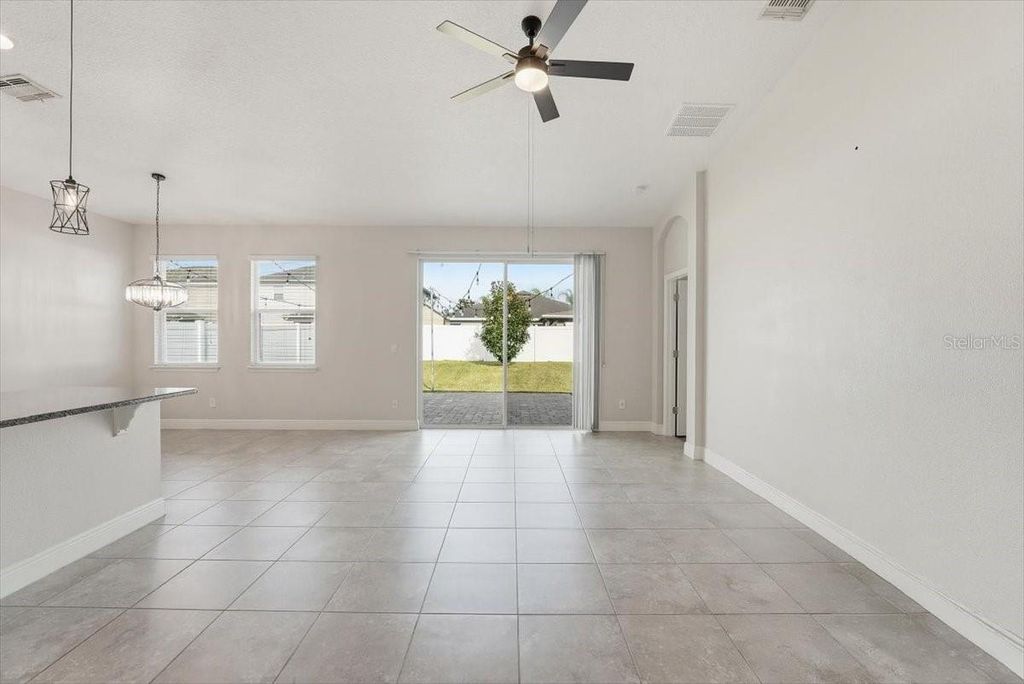 Photo of 11007 Inside Loop, Orlando, FL 32825 (MLS # O6368473)
