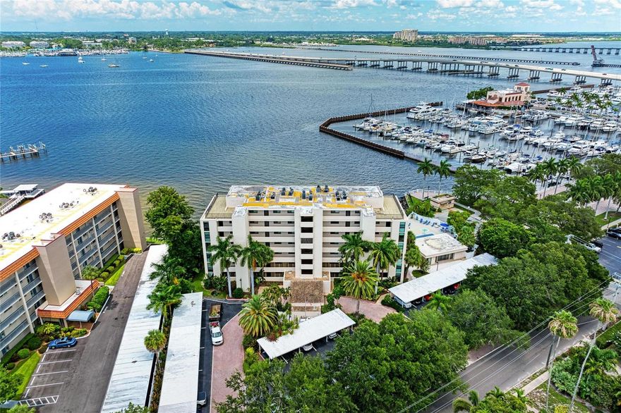One of the best views in all of downtown Bradenton. Take the elevator to 2nd floor and walk into paradise, where you feel like you are on a cruise ship. Everything sparkles and shines with all the natural light from windows on three sides! Your own totally updated 2/2 END unit condo overlooking the Manatee River.  End units rarely come up! Since this part of the river is saltwater, you can watch dolphins and manatees from your screened in lanai while sipping your coffee. Newer kitchen (cabinets, Sparkling white quartz counter tops, stainless steel appliances and even a reverse osmosis water filter on the kitchen sink). A perfect condo to entertain in. Tile flooring throughout. The master and living rooms have spectacular full river views. This unit also features hurricane impact windows.  The HVAC is even upgraded with a UV light to improve indoor air quality.  This is a small community with 33 units. One small pet is allowed. Complex features small beach, Community pool, hot tub, and community meeting room that has a sauna, kitchen and pool table. The building borders the Riverwalk that lines the waterfront of downtown Bradenton. It is an excellent area to exercise, stroll or just to have plain have fun. You are only a few short blocks to all the restaurants and bars. This is downtown living at its finest. This is one of the best buys on the Manatee River. The condominium passed their engineering milestone.