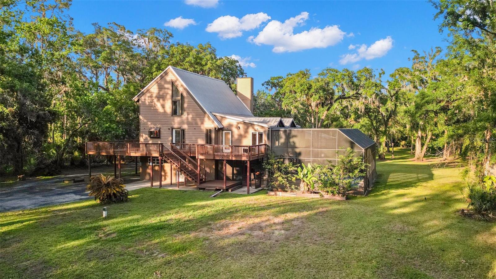 WOW !!! WELCOME to One of a kind Waterfront Home a Unique blend of Country - Style living and proximity to Tampa's urban amenities. Situated an Over 2.5 acres in a private lot on the Alafia River. This beautiful home has 5 bedrooms and 3 bathrooms. The main level is magnificent for entertaining with a beautiful living room, vaulted ceilings, and wood burning fireplace. The oversized family room overlooks the pool and includes beautiful bookshelves for the avid reader at heart.The Master's bedroom is on the third floor with its own cozy private balcony and fireplace overlooking this beautiful property which is a perfect way to start or finish your day. Bring your Boats, RV, CAMPER, TOYS etc.. NO HOA !! NO CDD !! or Deed Restriction.So the Choice is vast and all yours !! The back yard is perfect for Grilling and entertaining. Feel Like a VACATION HOME. The river is perfect for boating or fishing and connects directly into Tampa Bay Massive trees and plenty of room to have all the fun you want with. A beautiful deck wraps around the second story of the house. On the first level, you will enjoy gorgeous Travertine Stone wrapping around the saltwater pool. Enjoy beautiful nights while you entertain under this beautiful Lanai overlooking this lavish estate. If you get too hot you can stroll into the large game room and cool down while relaxing and watching your favorite movie. AS-1 agricultural so you can have horses or livestock. Bring your boat or RV to store on a 6-inch concrete covered slab. Perfect coverage to store them out of the sun and included 30’x 30’ enclosed Workshop to store or work on your toys.!! Location !!! Location is amazing close to Fishhawk sports park, downtown Tampa, Hopistals and easy access to the restaurants.The home is located almost end of the road loads of privacy.This is a one of a kind Property.