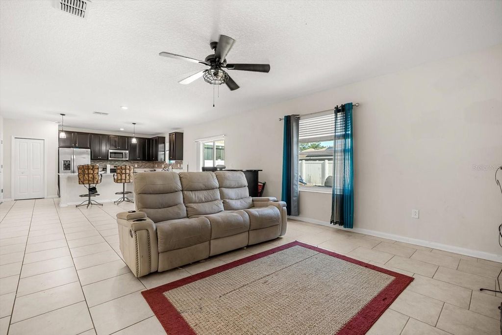 Photo of 542 Patton Loop, Bartow, FL 33830 (MLS # O6298449)