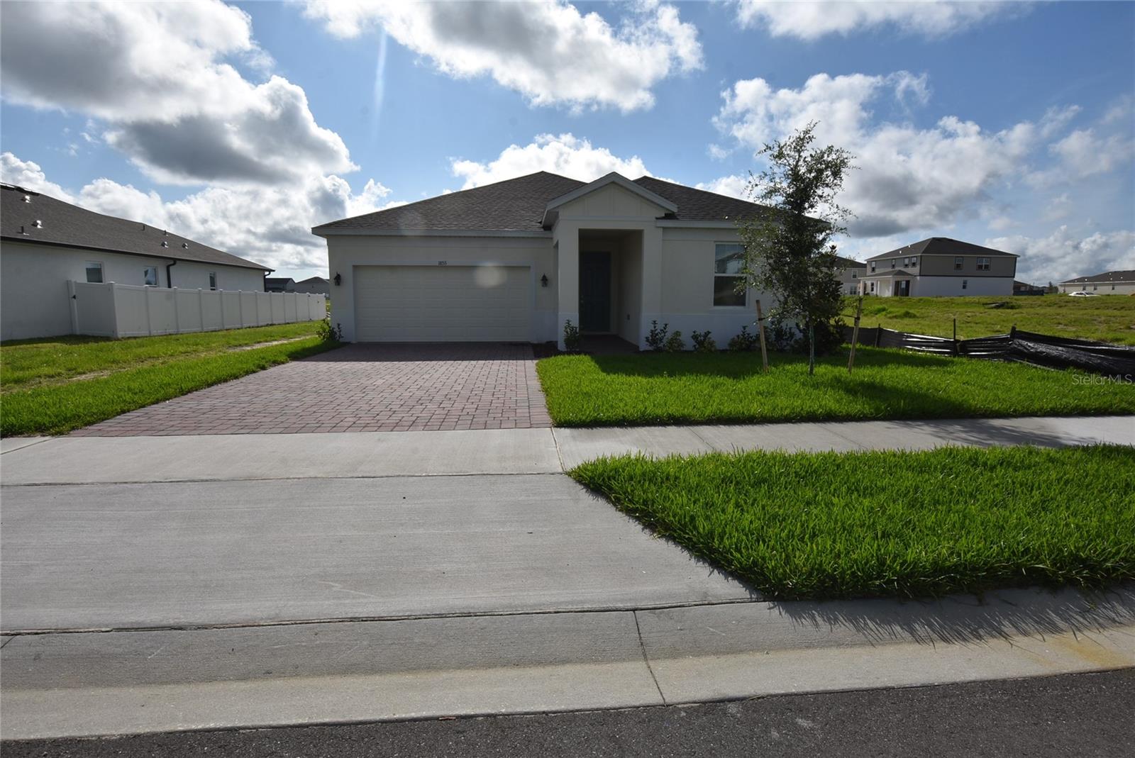 Brand New one story home the Hayden Model Located at the stunning community of Groveland Trinity Lakes. 4 bedroom 2 full bath. Spacious living room that opens up to the kitchen and dining Area. inside laundry. Kitchen with all stainless steel new appliances, stone counter tops and kitchen Island. Spacious walk-in Pantry. Master split, all bedroom floors are carpeted. Wall-to-wall ceramic floors through out kitchen , bathrooms and Landry room. Half a bath. 2 car garage with electric remote controlled openers. Covered patio.
Trinity Lakes Community has state of the Art Swimming Pool, club, picnic and play grounds. Quiet Country stile living. Conveniently located with easy access to C.R 19, Hwy 27 and Florida's Turnpike.