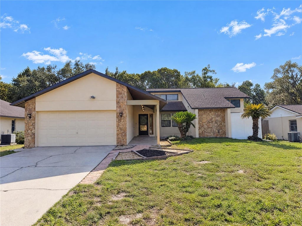 Photo of 5201 Eagle Island Drive, Land O Lakes, FL 34639 (MLS # O6453984)