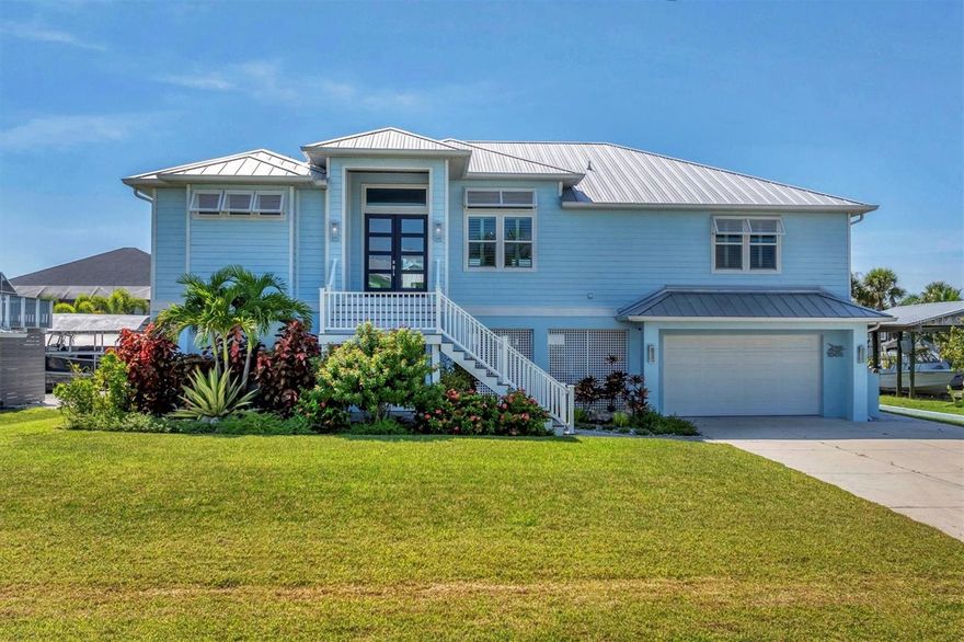 Living the LUXURY LIFESTYLE on the Intracoastal Waterway & Lemon Bay is ONE home away from
reality! By water, the deep canal with NO BRIDGES is a boater’s dream come true! You are minutes from
STUMP Pass & the Gulf or motor South to Boca Grande & Charlotte Harbor. Prefer to hang local? Enjoy the
beautiful sandbars and miles of beach in Englewood. Welcome to 10476 Sherman Street situated in Palm
Harbor with no HOA fees or restrictions! This magnificent elevated 2020 custom built home features state-of-the-art design & intricate details. A complete property feature list is available on request. To peek your interest, here are a few top reasons to
book a flight or plan a road trip to personally view this home: Move in immediately or promote
this popular vacation destination on AIBNB. Walking distance to the Cape Haze Marina and Freedom Boat Club IMPACT windows and doors * METAL ROOF * Cement FiberSiding * Covered BOAT LIFT * 93 Ft of SEAWALL * 1,200 lb. capacity CARGO LIFT * SALTWATER &
HEATED POOL with Zero Edge / Perimeter Overflow SPA * Amazing screened entertainment sitting and
outdoor kitchen space at pool level * Elevated screen porch deck overlooking pool and canal facing the Western
Sunsets * 90 degree ZERO Corner SLIDERS * Coffered vaulted ceilings * Plantation Shutters * Sonos Sound
System *Granite from Brazil kitchen counter tops * Built-in double over and stove top * Granite dual vanities in primary
suite * ROMAN walkthrough shower with stained glass accent wall * Private Guest Suite stairway and entrance
*split bedroom floorplan*** This impeccable home feels and looks brand new. The owners reside periodically
and did not rent the home out to vacationers. The outdoor screen space underneath this elevated home is a
versatile multi-purpose open air living area protected from sun and rain. The unique layout feels like part of
your living space. The garage is separated by a wall and entrance door so you do no feel like you are
entertaining or relaxing in your garage. Coastal living at its finest! Do not hesitate on this one, call for your
private showing today.