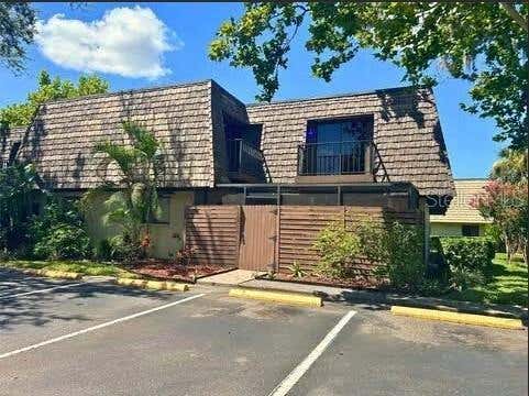Photo of 15202 E Pond Woods Drive #9, Tampa, FL 33618 (MLS # R4911740)