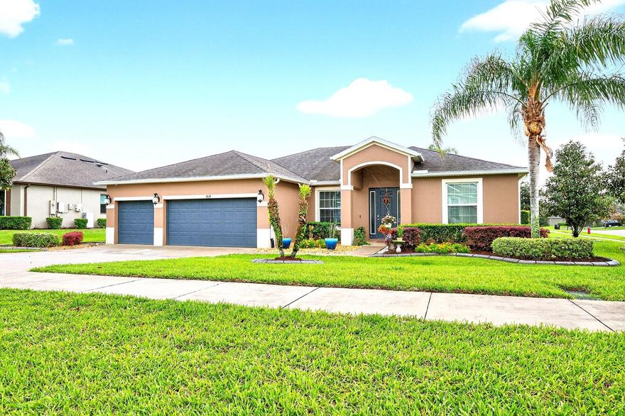 Seller may consider buyer concessions if made in an offer ~ Freshly updated and MOVE-IN READY, this single-story 5-bedroom POOL HOME sits on a spacious .43 ACRE ~ CORNER LOT in the sought-after Rock Springs Ridge community of Apopka – offering the space, privacy, and outdoor lifestyle you have been searching for! **IN 2026** FRESH INTERIOR PAINT in the primary suite, living areas, and front bedroom **IN 2025** Decorative ACCENT WALL added in the primary bedroom, upgraded faucets in the primary bath **IN 2021** TILE FLOORING added to the primary bedroom and closets ** IN 2020** CROWN MOLDING added throughout the main living areas and primary bedroom, CUSTOM KITCHEN BACKSPLASH, and decorative accent walls in the living room and guest bedroom. From the moment you arrive, the 3-CAR GARAGE, mature landscaping, and oversized corner lot set the tone. Inside, the home feels light, open, and welcoming with a flowing layout designed for both everyday living and entertaining. The kitchen is centrally located with UPDATED STAINLESS STEEL APPLIANCES (all recently replaced except the stove), a custom backsplash, and easy connection to the main living and dining spaces. The PRIMARY SUITE is tucked away at the back of the home for privacy and features updated finishes, tile flooring, a decorative accent wall, and a spacious en-suite bath. With five true bedrooms, there is flexibility for guests, a home office, or multi-generational living. Step outside and the Florida lifestyle really shines – your BACKYARD RETREAT is FULLY FENCED and designed to enjoy year-round. Relax by the POOL, entertain at the TIKI BAR (included!), or gather around the custom FIRE PIT on a concrete slab. Concrete curbing and thoughtful landscaping complete the tropical feel, creating a space that truly feels like your own private escape. Additional highlights include a TESLA EV CAR CHARGING STATION and laundry room cabinetry for added storage. Rock Springs Ridge is known for its quiet, established feel, GOLF COURSE access, TRAILS, and proximity to everything Apopka has to offer. Zoned for top-rated schools – including the new KELLY PARK K-8 nearby – and just minutes to SR 429, shopping, dining, the Northwest Recreation Complex, Wekiwa Springs State Park, and Lake Apopka. A rare combination of space, updates, and outdoor living all on one level – this one checks all the boxes. Call today to schedule your tour!