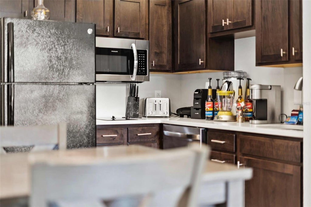 Photo of 8303 Palm Parkway #403, Orlando, FL 32836 (MLS # TB8544351)