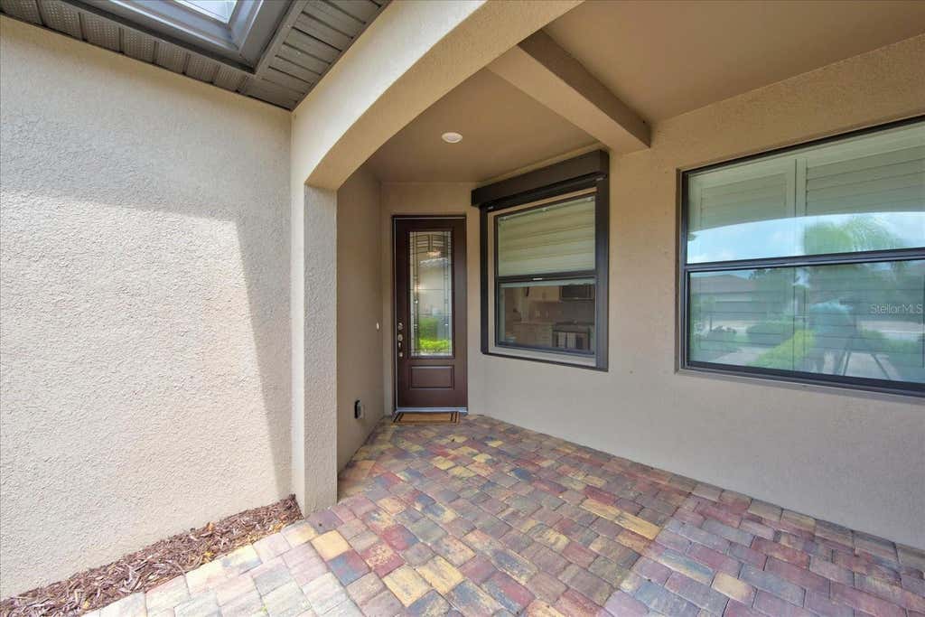 Photo of 7653 Summerland Cove, Bradenton, FL 34202 (MLS # A4701490)