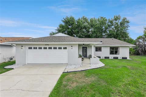 Photo of 10792 Lazy Lake Drive, Orlando, FL 32821 (MLS # O6409534)