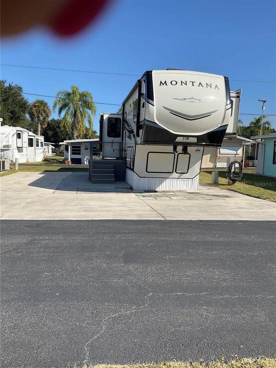 Lake Okeechobee access -Looking for the perfect winter retreat- check out this high-end 2022 35' Montana Fifth wheel, with three slides, on Deeded lot in Fish Eating Bay Condos- Features include ducted roof air, solid wood cabinets, Full-size stainless-steel appliances, cultured marble countertops, beautiful laminate flooring, oversized shower, ceramic toilet, central vacuum, surround sound, full size stackable washer & dryer, tons of inside and outside storage, and a 40' driveway giving you plenty of parking for your boat! Fish eating bay condos is delightful waterfront community, with low HOA dues, no age or rental restrictions, clubhouse, heated swimming pool, boat ramp, fish cleaning building, bathhouse, & laundry mat, located just minutes from Lake Okeechobee, and the new Hard rock casino. all measurement approx. call today!