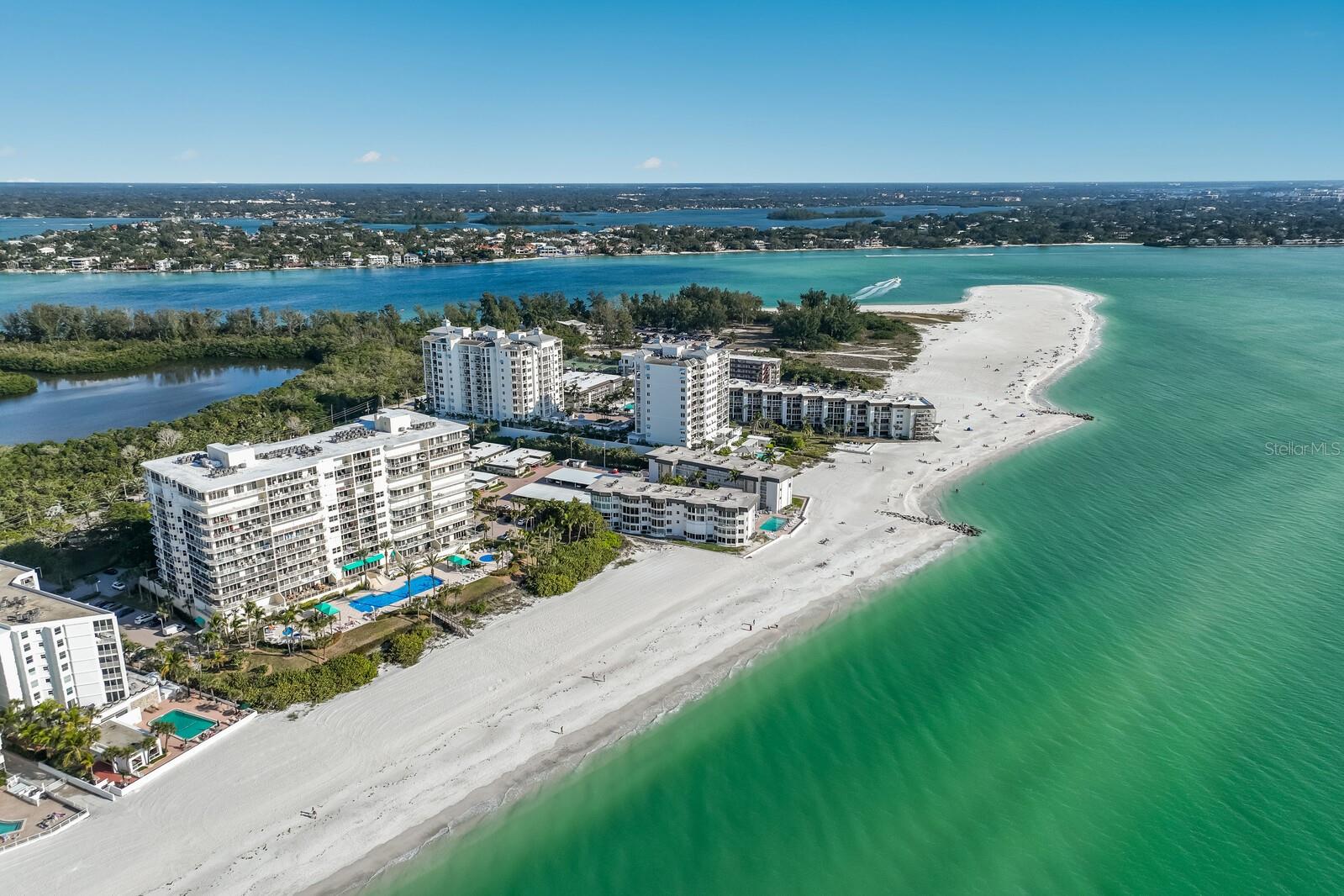 Premier Beachfront living with the best panoramic view on Lido Key! 6th floor CORNER unit at L'Elegance on Lido Beach with amazing Gulf Front Views is available for the first time on the market! Over 2,000+ square feet of living space inside your new beachfront retreat that is ready to be transformed. Enjoy your 590 square feet of Private wrap-around Terrace space overlooking the Gulf! This fantastic floor-plan offers open living with impressive Gulf views from almost every room and floor to ceiling glass sliders. The bright and spacious Living/Dining combo is sure to wow your visitors with unrivaled Sunset views nightly. Your large Kitchen space has views of downtown Sarasota and the Sarasota Bay. The oversized Primary Suite features a large walk-in closet and massive bathroom. Two sizable guest Bedrooms, one which is being used as an Office space can easily be converted back to a bedroom along with two full guests Bathrooms. L'Elegance is located on 400-feet of pristine Lido Key with secure garage parking under the building, storage unit, manned gated entry, and on site management. Top tier amenities include a Fitness Center, Har-Tru Tennis Courts, an 85 foot heated Pool, Spa, Game Room, large Gulf-front deck, and Clubhouse. This well maintained and well managed building is pet friendly. Conveniently located close to downtown Sarasota and St Armands Circle.