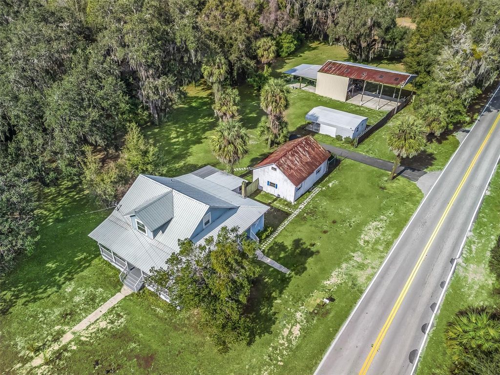 Photo of 10487 SE Highway 42, Summerfield, FL 34491 (MLS # G5106449)