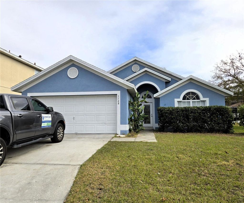 Photo of 1128 Pinedale Drive, Davenport, FL 33897 (MLS # O6368749)