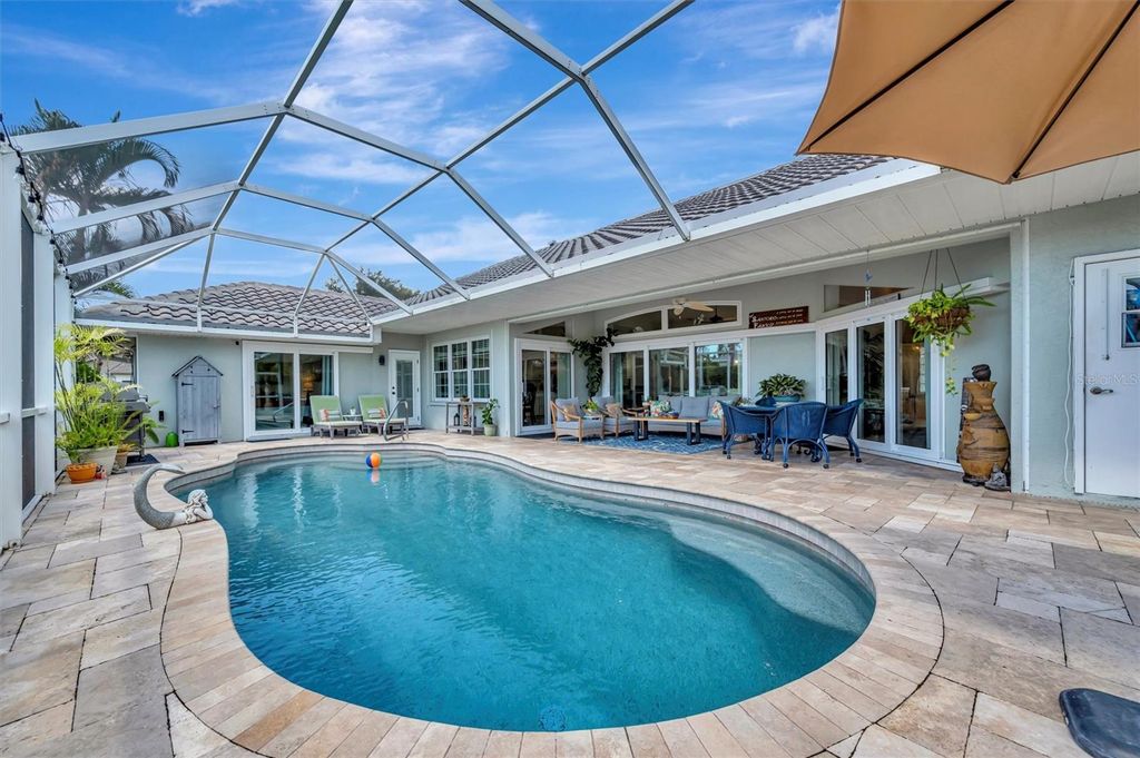 Photo of 8173 Misty Oaks Boulevard, Sarasota, FL 34243 (MLS # A4659514)
