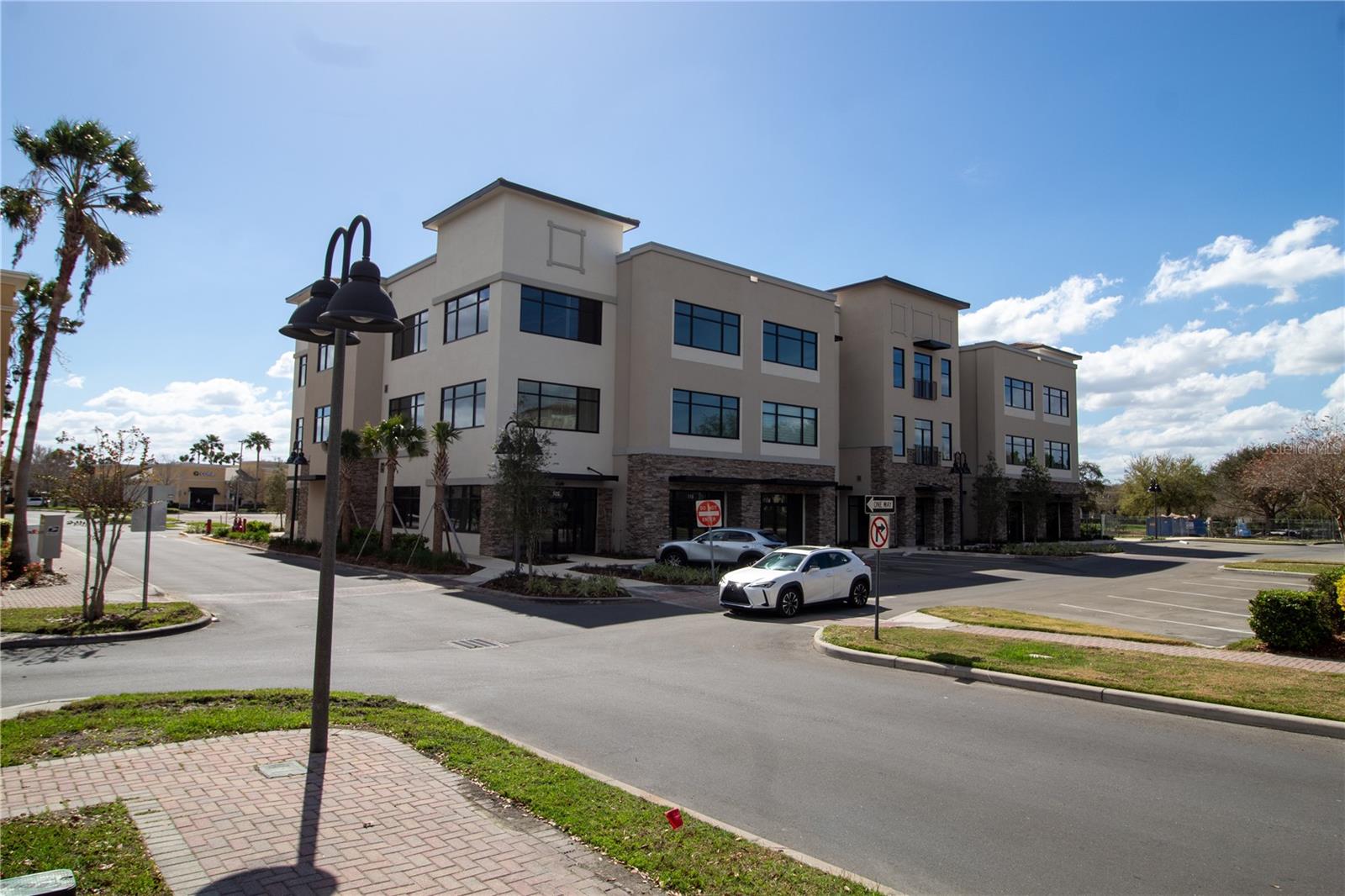 Available for Sale, this newly constructed office building (2024) this office boasts exceptional visibility and connectivity, catering to a diverse range of professional and medical uses. Located in the highly desirable Hunter’s Creek Community, this property provides exceptional visibility and accessibility, just 15 miles south of Downtown Orlando. The location ensures easy access to Highway 417, Orlando International Airport, and Lake Nona, making it a strategic choice for professionals and medical practitioners. Delivered in Grey Shell