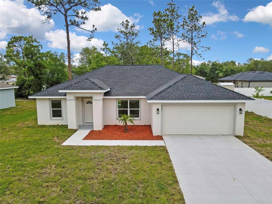 NEW CONSTRUCTION 3 bedrooms, 2 baths located in the heart of beautiful Citrus Springs. This move-in ready property offers a bright open floor plan with a gorgeous kitchen with many greats features, extended island in the kitchen, including 1 1/4 quartz counter tops, 36 inches wall solid wood cabinets with soft close hinges, pantry and full underneath with plenty space for prepare meals. The master bedroom include a private shower bath with a beautiful porcelain tile, stone shower floor, double sink  and walk-in closet. Vaulted celling in the living area and vinyl plank floor throughout the entire home. Enjoy the yard with cover lanai, perfect for the entertaining, relaxing or creating your own outdoor oasis.
Located near Withlacoochee Trail, rivers and springs allows for outdoor activities.The single family is located close to schools, hospitals and mayor shopping center. NO HOA. Deep restriction community. Come a take a look !