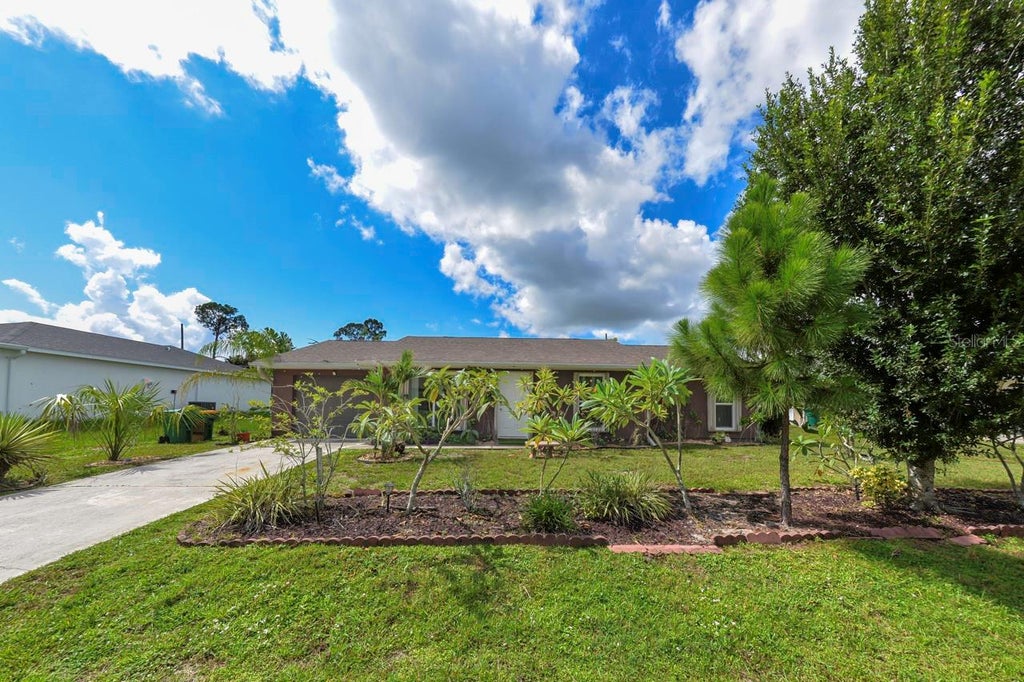 Photo of 2678 Rock Creek Drive, Port Charlotte, FL 33948 (MLS # C7529772)