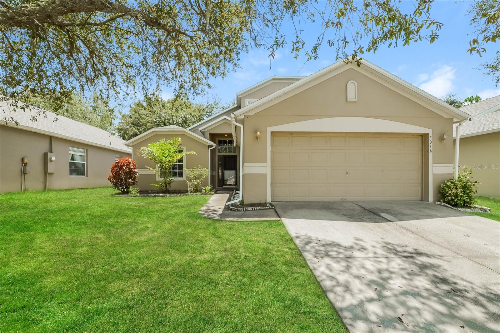 Charm and curb appeal abound for this Groveland home! Step inside into the inviting foyer and through into the well-appointed living room, which is situated at the center of the home. Through the dining room you'll find the kitchen, which boasts stainless steel appliances, hard surface countertops, and ample storage. The primary suite and laundry room round out the main floor. On the second story you'll find three secondary bedrooms and a loft. Enjoy your private, enclosed backyard all year long! Come and see today the possibilities that this home has to offer!