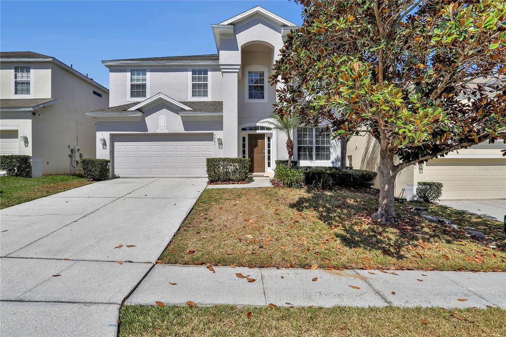 Photo of 7761 Tosteth Street, Kissimmee, FL 34747 (MLS # O6376480)