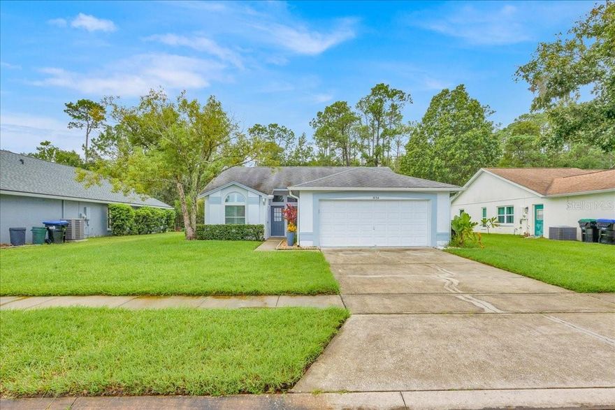 Move-in ready and beautifully fully furnished, this 3-bedroom, 2-bath home with a 2-car garage offers the perfect blend of comfort, convenience, and natural beauty — just 10 minutes from SeaWorld and the new Epic Universe theme park. Inside, enjoy a bright, open floor plan with a spacious living area featuring stylish furnishings, a modern kitchen with all appliances, and a cozy dining space perfect for everyday living or entertaining. The primary suite includes a private bath and generous closet space, while two additional bedrooms provide flexibility for guests or a home office. Step outside to your covered patio and take in the peaceful conservation views — with no rear neighbors and direct access to Shingle Creek Conservation land. Experience daily visits from white-tailed deer and local wildlife, creating a serene, nature-inspired setting right at home. Residents also enjoy access to fantastic community amenities, including a resort-style pool, basketball court, community garden, playgrounds, and clubhouse — offering plenty of recreation and relaxation options year-round.