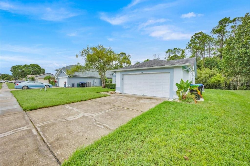 Photo of 5734 Delano Lane, Orlando, FL 32821 (MLS # O6356928)