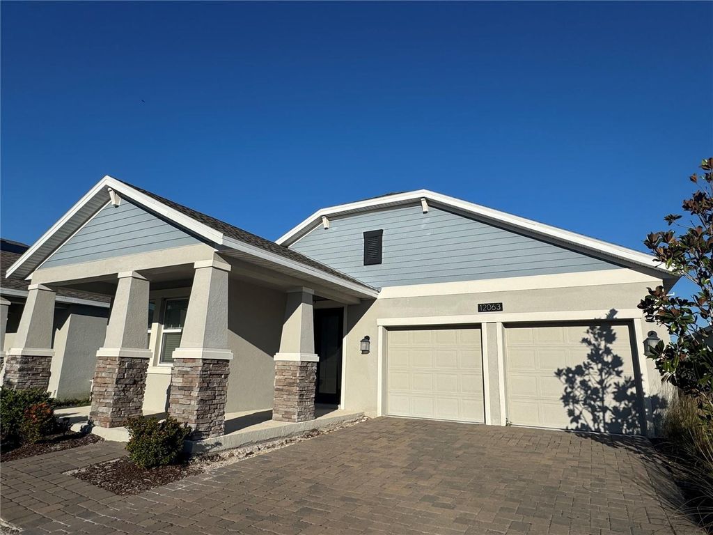 Photo of 12063 Language Way, Orlando, FL 32832 (MLS # O6370407)