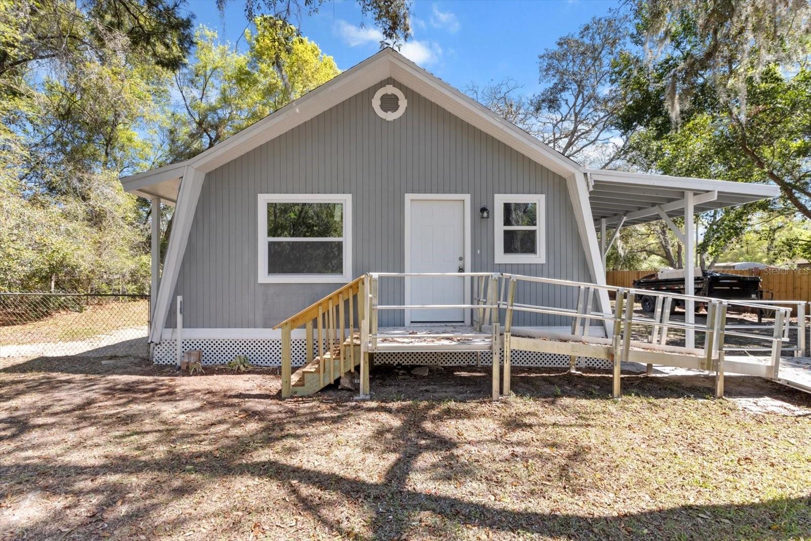 Welcome to 383 S Rooks Ave, a tucked-away treasure in the heart of Inverness. This 2 bedroom, 2 bathroom home pairs small-town charm with modern comfort, offering updates that include a brand-new roof, dual-pane windows, and luxury vinyl plank flooring throughout. The modernized kitchen features quartz countertops and new stainless appliances, bringing both style and function to the home. Outside, the character continues with a classic picket fence, shady red cedar and oak trees, a covered porch awning, fenced backyard, and storage shed. What makes this home shine is its location—just minutes from historic downtown Inverness, where you’ll find restaurants, shops, concerts, and community events. The famous Withlacoochee State Trail, perfect for biking and e-biking, winds right through town, while nearby lakes, parks, and preserves offer endless opportunities for fishing, hiking, and outdoor fun. Everyday conveniences are also close at hand with grocery stores, local schools, and healthcare facilities just a short drive away. Here you can enjoy the peace of a hidden retreat while staying connected to everything that makes Inverness such a vibrant and welcoming place to live.