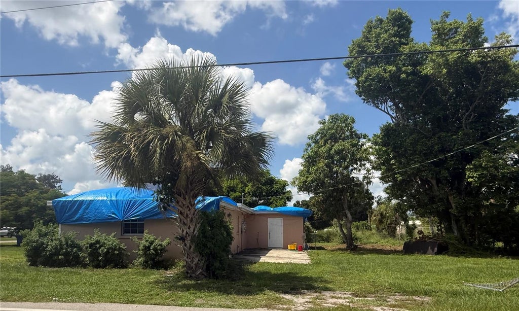 Photo of 321 Louise Avenue, Fort Myers, FL 33916 (MLS # TB8548952)