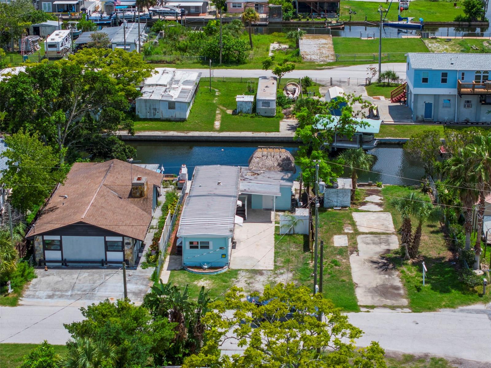 WATERFRONT!! DIRECT GULF ACCESS!! REMODELED 2/2 Single-wide with DIRECT GULF ACCESS for your boating and fishing fun!!! 2 bedroom GREAT little place to live or to rent out!! GREAT PRICE just for the lot by itself!! 2 bedrooms + 2 bathrooms inside the home + 1 bathroom in concrete building next to the home. 10 foot concrete seawall.