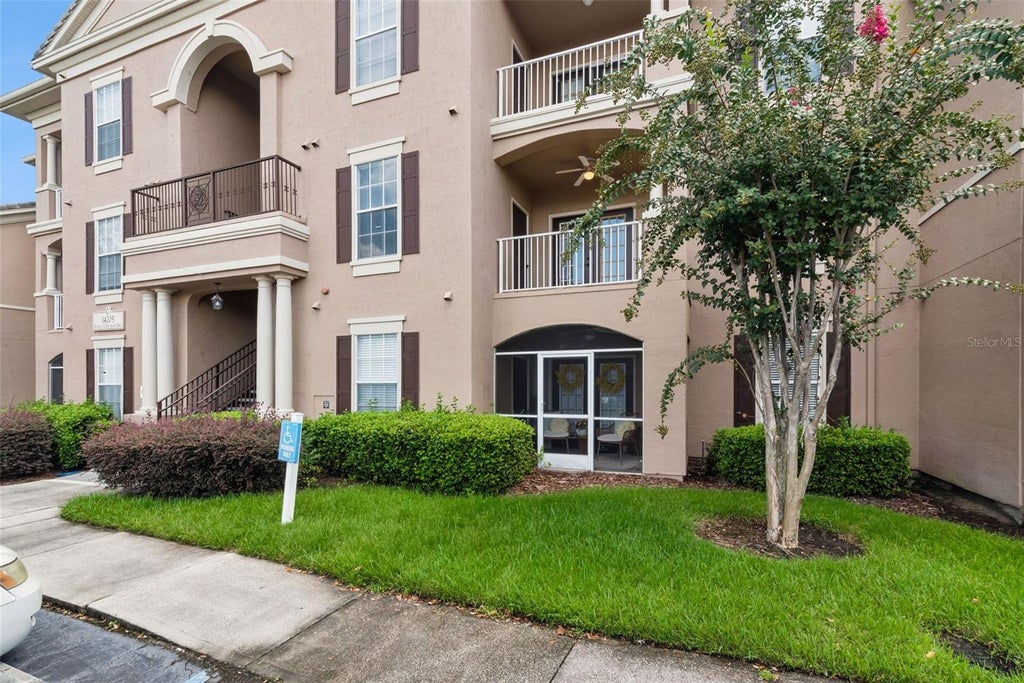 Photo of 14205 Falls Church Drive #2007, Orlando, FL 32837 (MLS # O6442004)