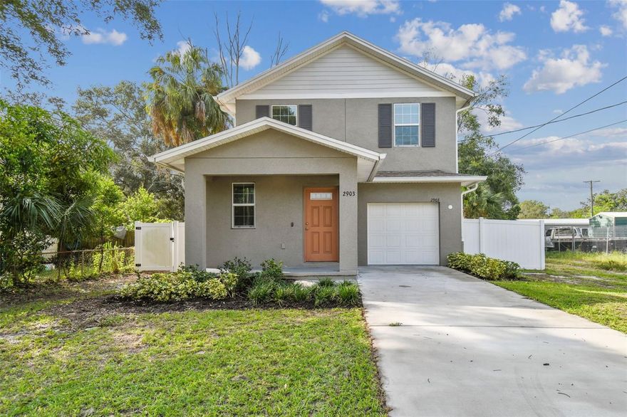 NEWER Construction - Built in 2021! MOTIVATED SELLER - seller is relocating for work! This is the investment break you have been waiting for. NOW is the time to buy this home, it is ahead of the curve due to the Tampa Gas Worx Project and the Design Collective's Ybor City Master Plan which are both residential and retail community master plans. Welcome to your exceptional home! What truly sets this home apart are its upgrades, ensuring both comfort and peace of mind. This impeccably maintained, NEWER home features state-of-the-art solar technology that will be paid off at closing, NEW 2023 Water Heater, Hurricane Windows, Honeywell Home Security System, Samsung 4-Door French Smart Refrigerator with Family Hub, and offers a wealth of amenities, including three bedrooms, 2.5 baths, a single-car garage, a utility room with Samsung stainless steel washer and dryer, and a generously sized fenced-in yard. As you step inside, you'll be greeted by stunning plank flooring that flows seamlessly through the open floorplan, encompassing the living room and casual dining area. The heart of this home is the spacious kitchen, which has been thoughtfully designed with modern conveniences in mind. It features recessed lighting that illuminates the gleaming granite countertops and stylish tile backsplash. The kitchen also boasts a breakfast bar, ideal for quick meals or socializing while preparing dinner. Top-of-the-line stainless steel appliances. The oversize sink and closet pantry add to the practicality and efficiency of this beautiful space.  The spacious owner's suite is a private retreat, offering a large walk-in closet and an ensuite bath. The large owner's bathroom is complete with dual sinks and a vanity seating area, a tiled walk-in shower, and a separate toilet room for added convenience.  The Nest Thermostat allows for energy-efficient temperature control. For added convenience there is also the Amazon Key App which allows secure package delivery, making online shopping a breeze.  This home is more than just a house; it's a testament to quality living in an area that is anticipated to be highly desirable in the coming years due to the Design Collective's 26th Street Ybor City Master Plan, where 26th street will be transformed into a neighborhood-serving retail and service corridor, and Tampa's Gas Worx Project! With easy access to Moffit, Downtown Tampa, some of the world's best beaches (ONLY 30 minutes to Clearwater Beach), Ybor City, easy and quick access to Route 75 and Route 4 makes traveling a breeze! Don't miss the opportunity to make this upgraded, almost-new residence in a prime location for now and years to come your own. Call the Listing Agent Today!