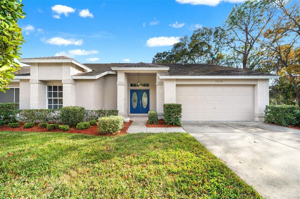 Photo of 7354 Woodhollow Road, Spring Hill, FL 34606 (MLS # W7882356)