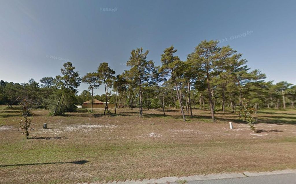 Photo of 114 White Blossom Trail, Port St Joe, FL 32456 (MLS # O6367054)