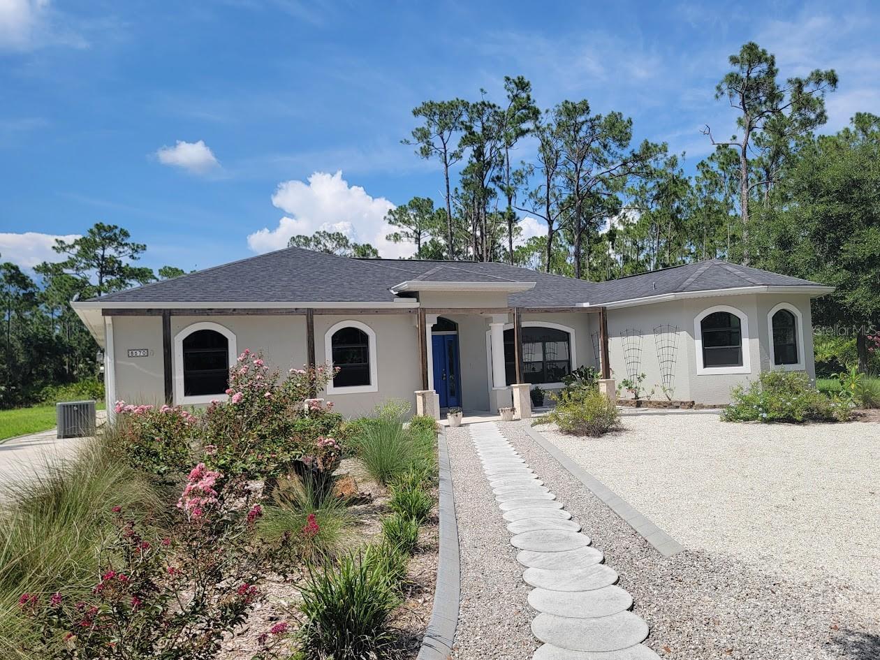 Unique opportunity OFFERING BOTH SPACE AND PRIVACY. A large 2,135 sq. ft. , Four bedroom, two bathroom home on five acres in North Port Estates. The house is situated on a lot 311 x 652 sq. ft. Less than five minutes to I-75 and less than ten minutes to North Port City Hall with all of it's shopping and restaurants. Owner has installed a $10,000 water system so the home has clean, good tasting water. Pets will love this home. House is leased until August, 2026.
